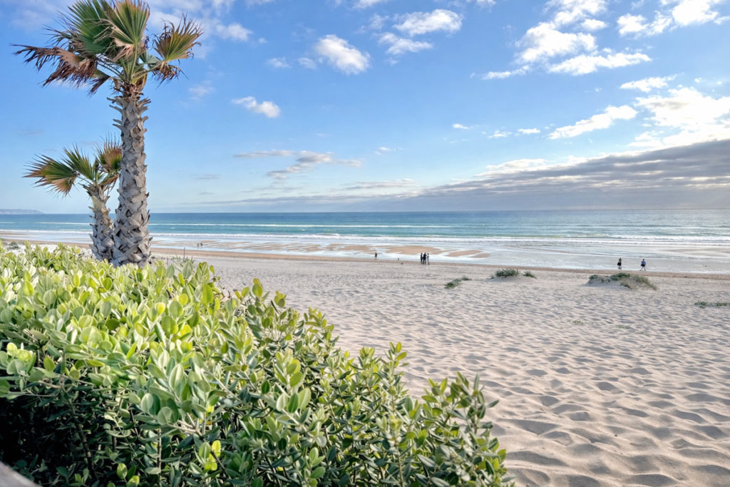 The wide open sand of Fonte da Telha beach, Costa da Caparica