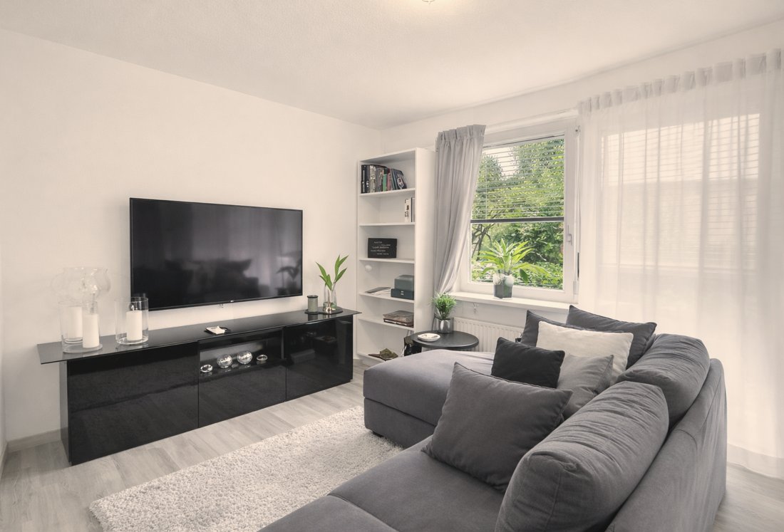 Bright living room of a city apartment in Stuttgart