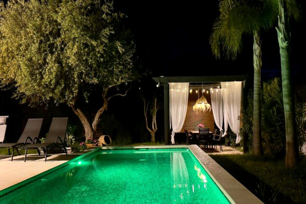 Pool lit up in the evening